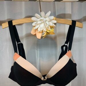 Black and Cream Push-Up Bra with Adjustable Straps and Two-Tone Design